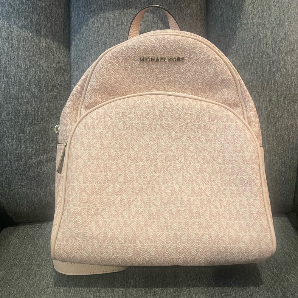 Light pink Michael Kors mini backpack
